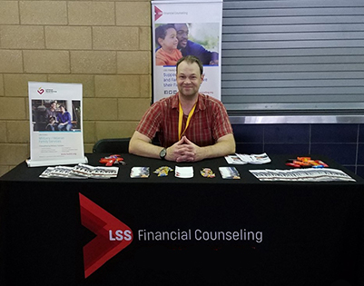 Man at Financial Counseling Booth