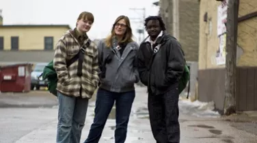 youth standing in street